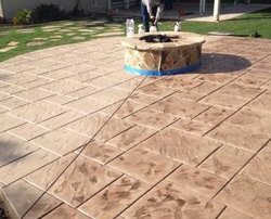 Sealed stamped concrete patio and fire pit