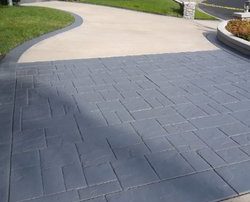 mix large driveway flat concrete slab with stamped concrete flagstone grey