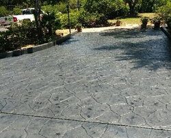 large stamped concrete driveway grey colored staining and sealing