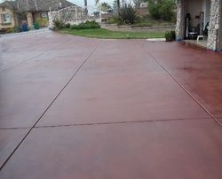 very large driveway concrete slab restoration and staining