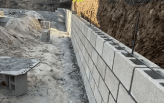 Retaining wall installation with Concrete blocks project services by Services in San Diego